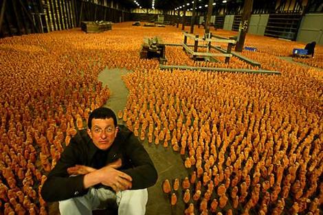 Antony Gormley with his 'Asian Field' made over five days in collaboration with 300 villagers in Xianxian in China